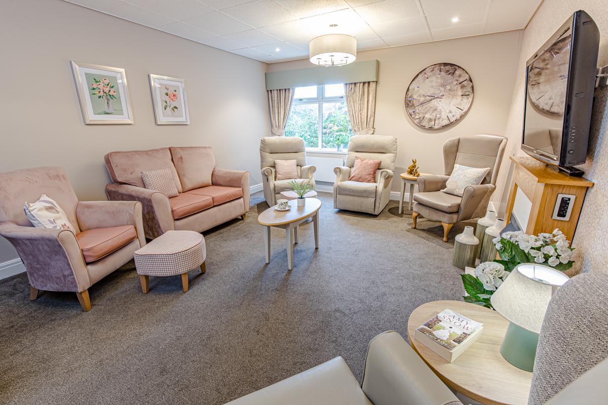 pink and beige seating in a care home lounge