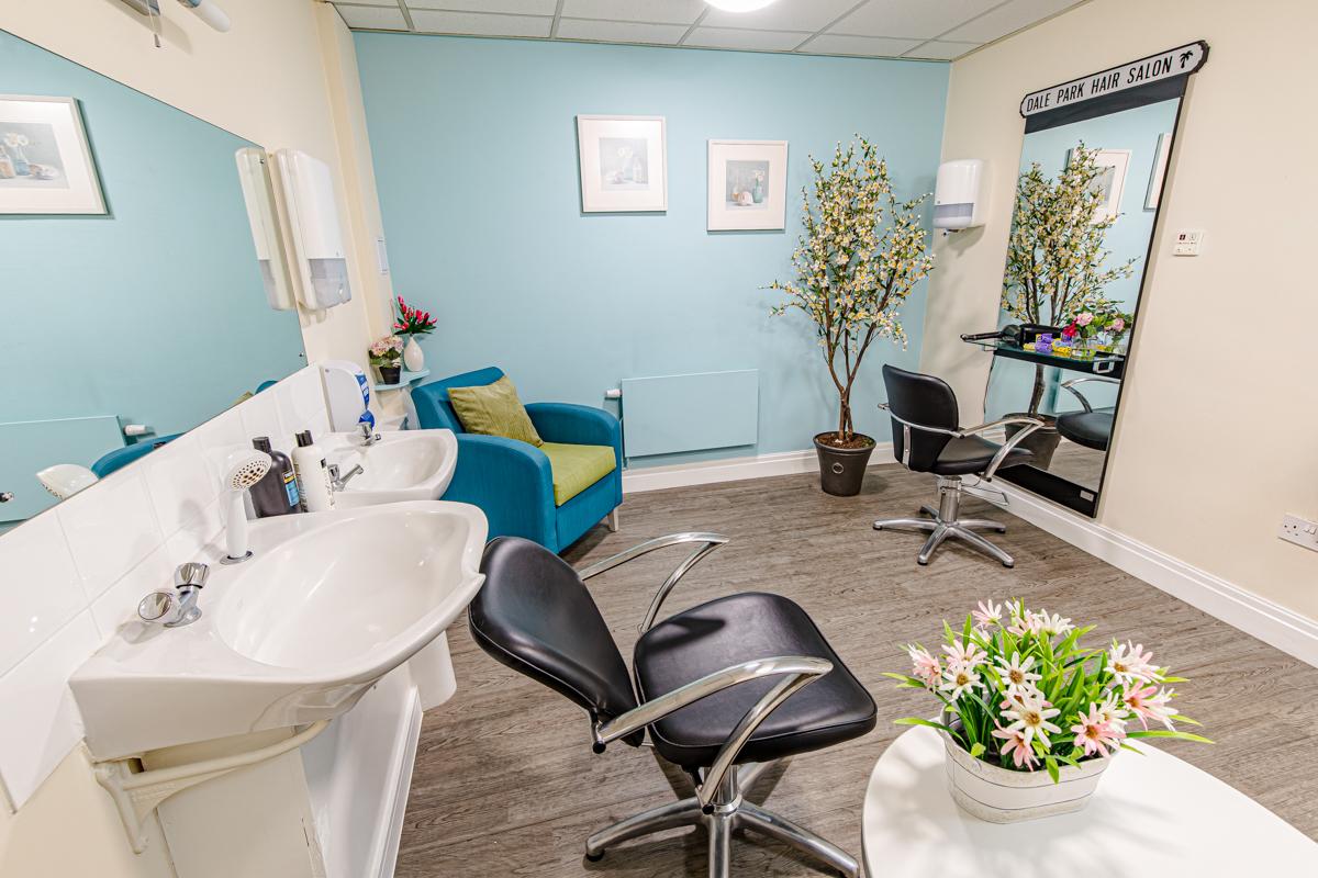 care home hair salon with chairs and sinks